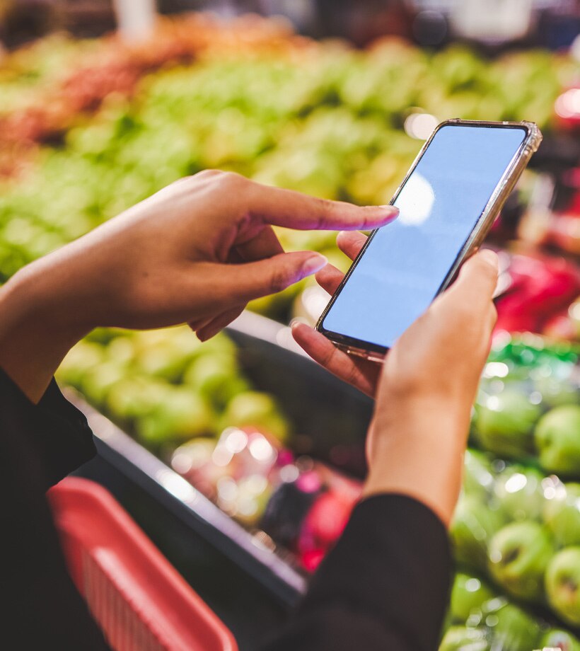 Hands on a phone taking a picture