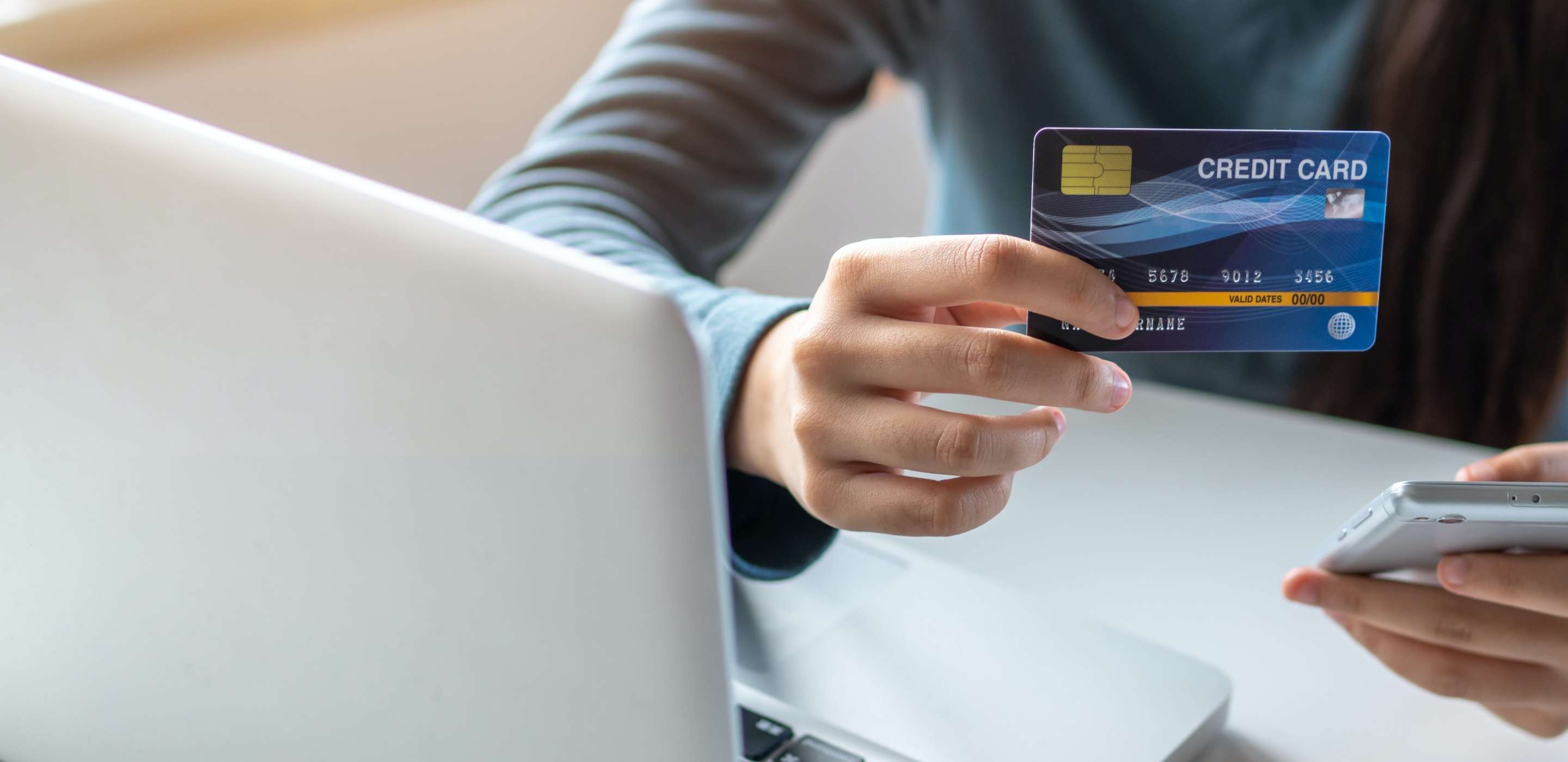 credit card being used to pay on phone