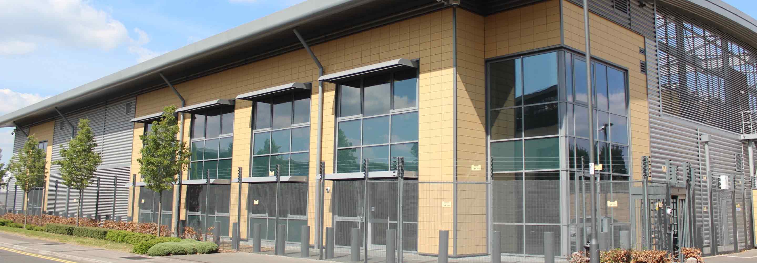 A yellow building with a balcony
