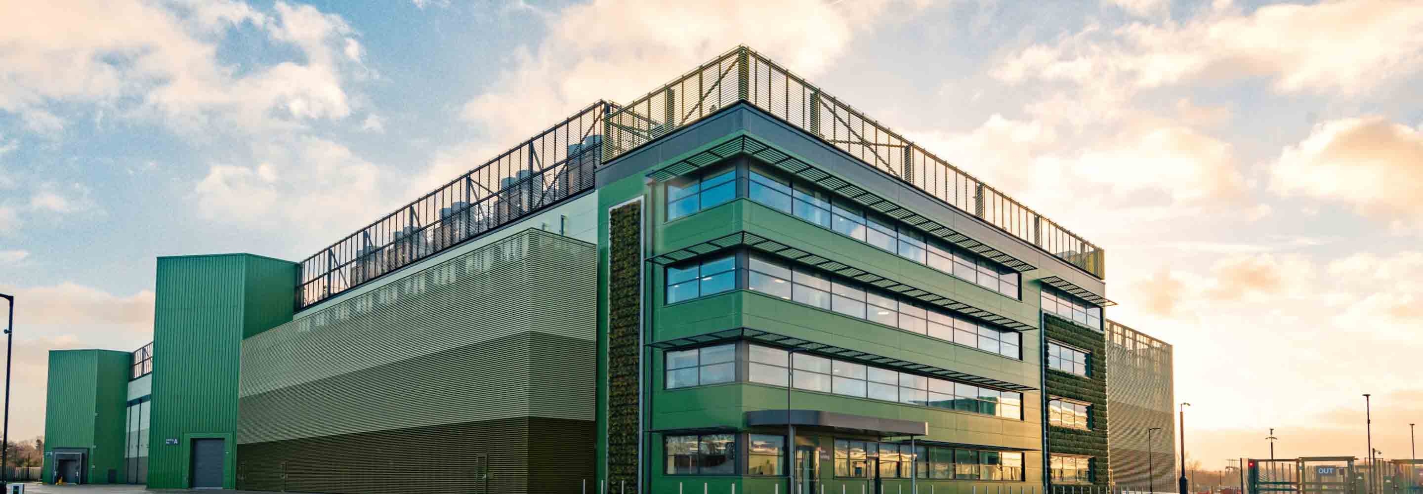 A three story building with wide windows