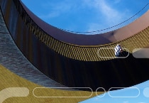 A person walking on a circular bridge