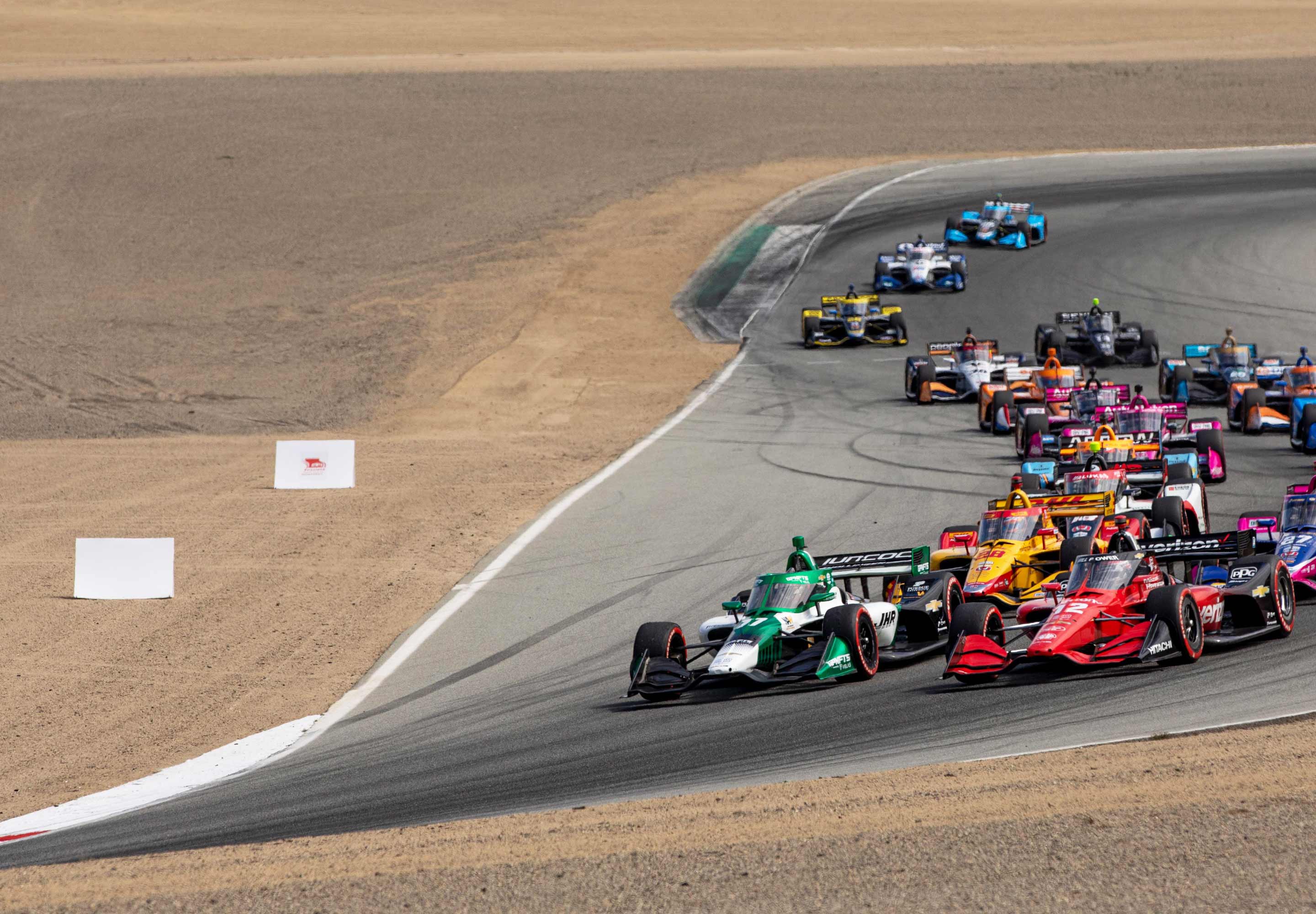 Race cars in a race track