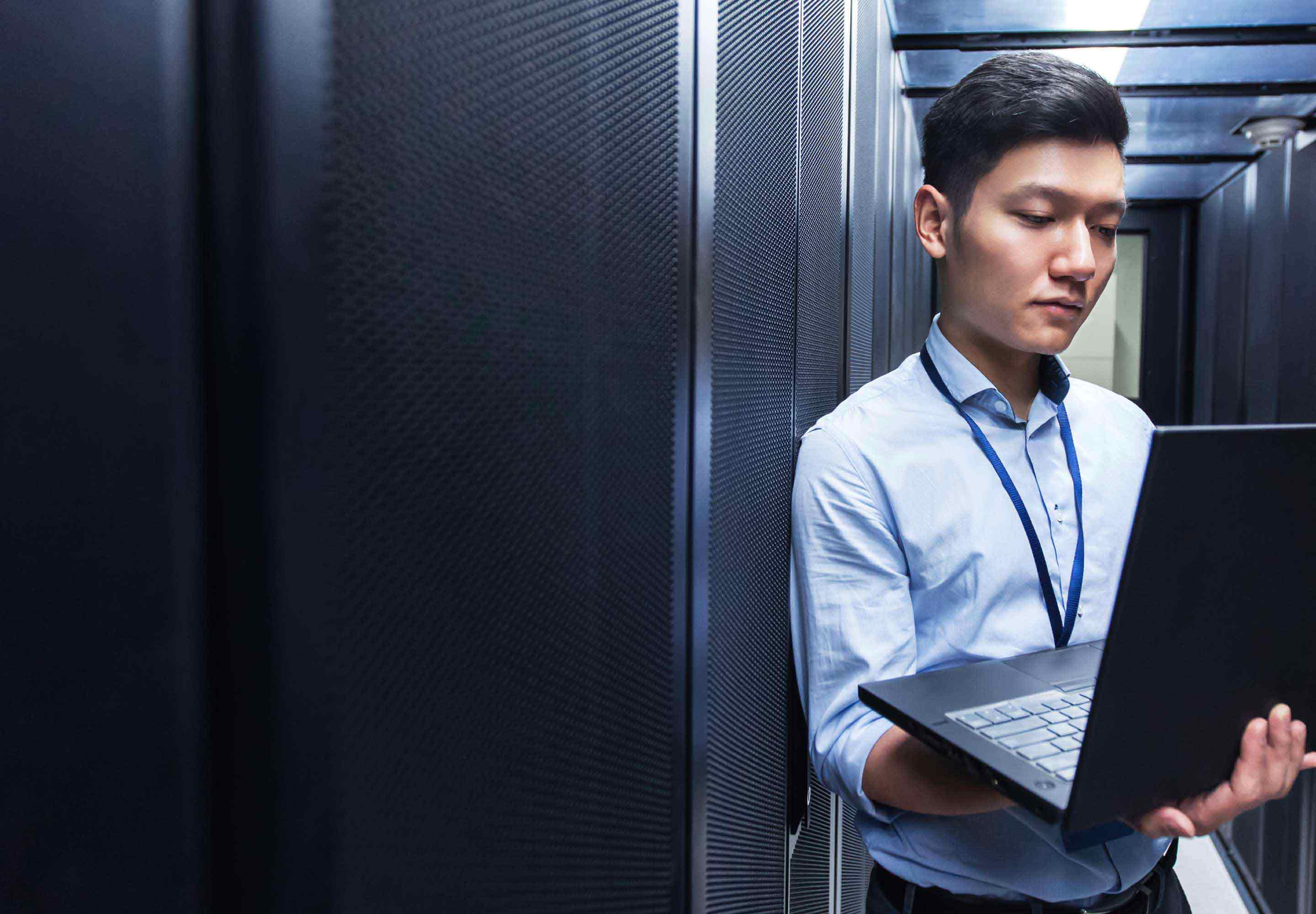 Man working in a server room