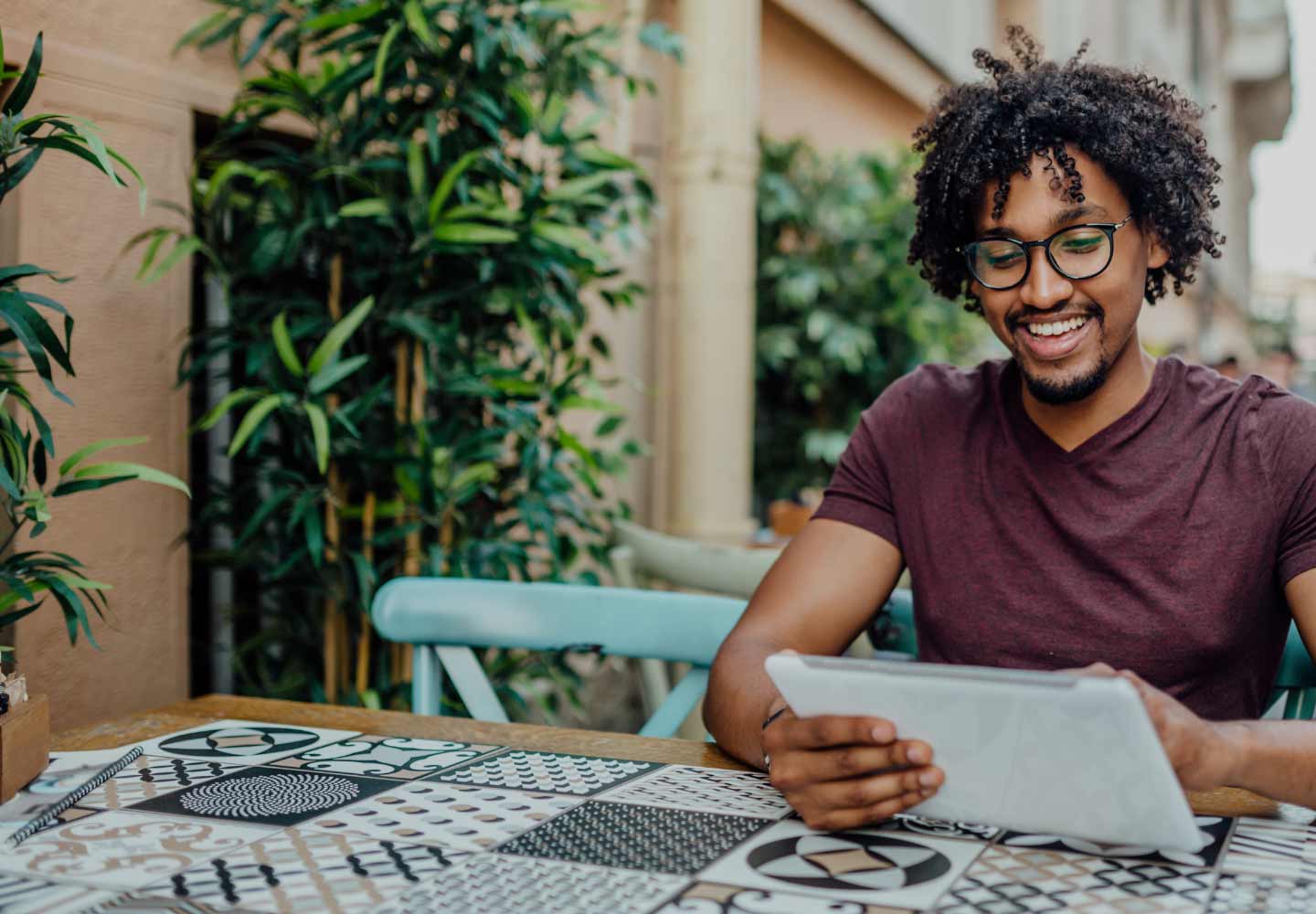 Man working remotely on tablet