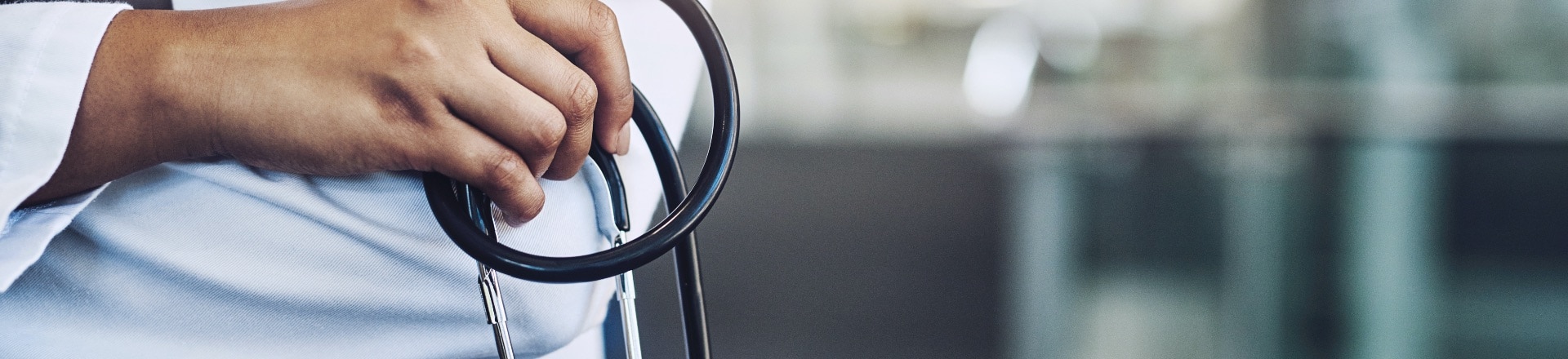 A doctor holding a stethoscope