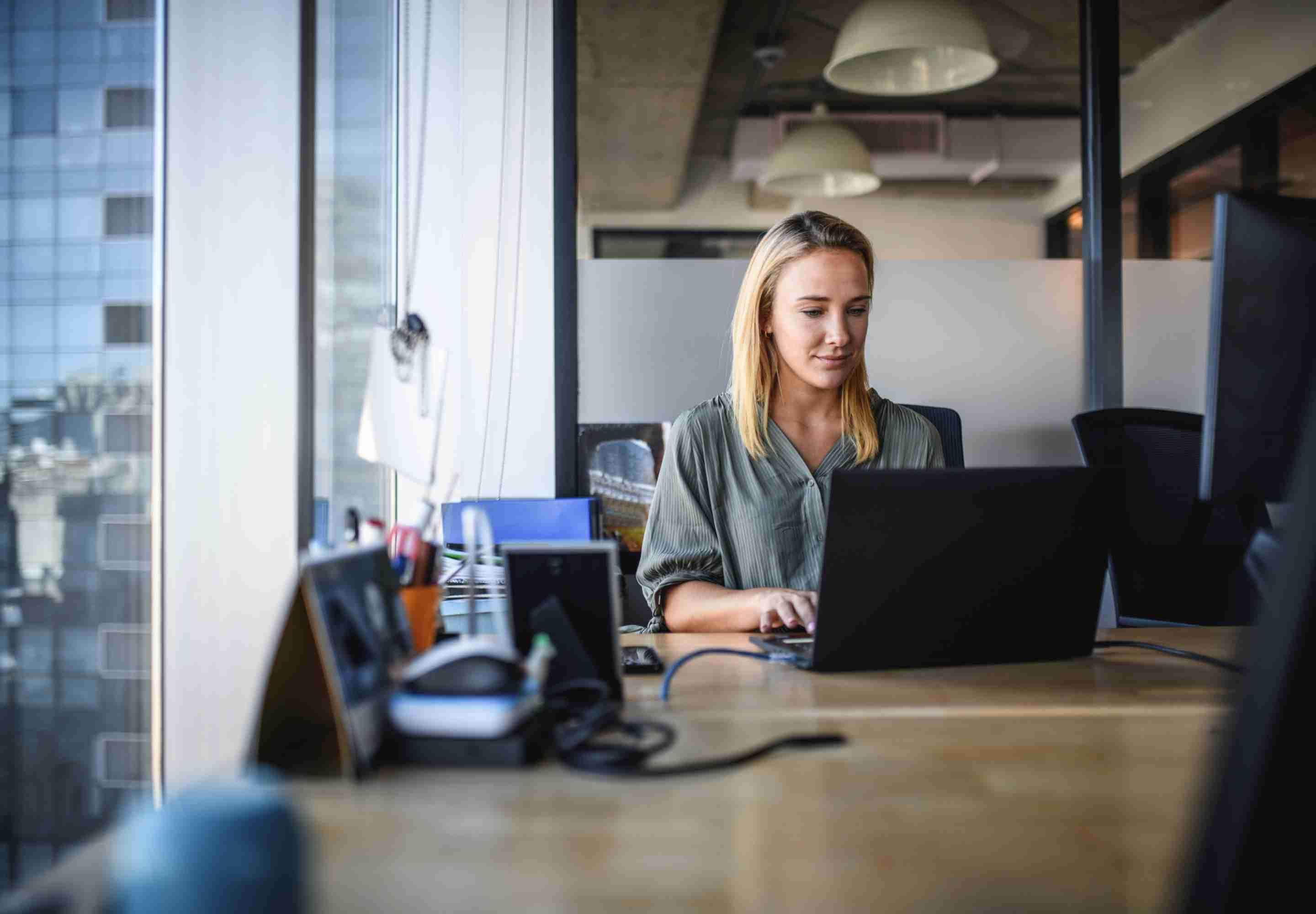 Woman at laptop in office