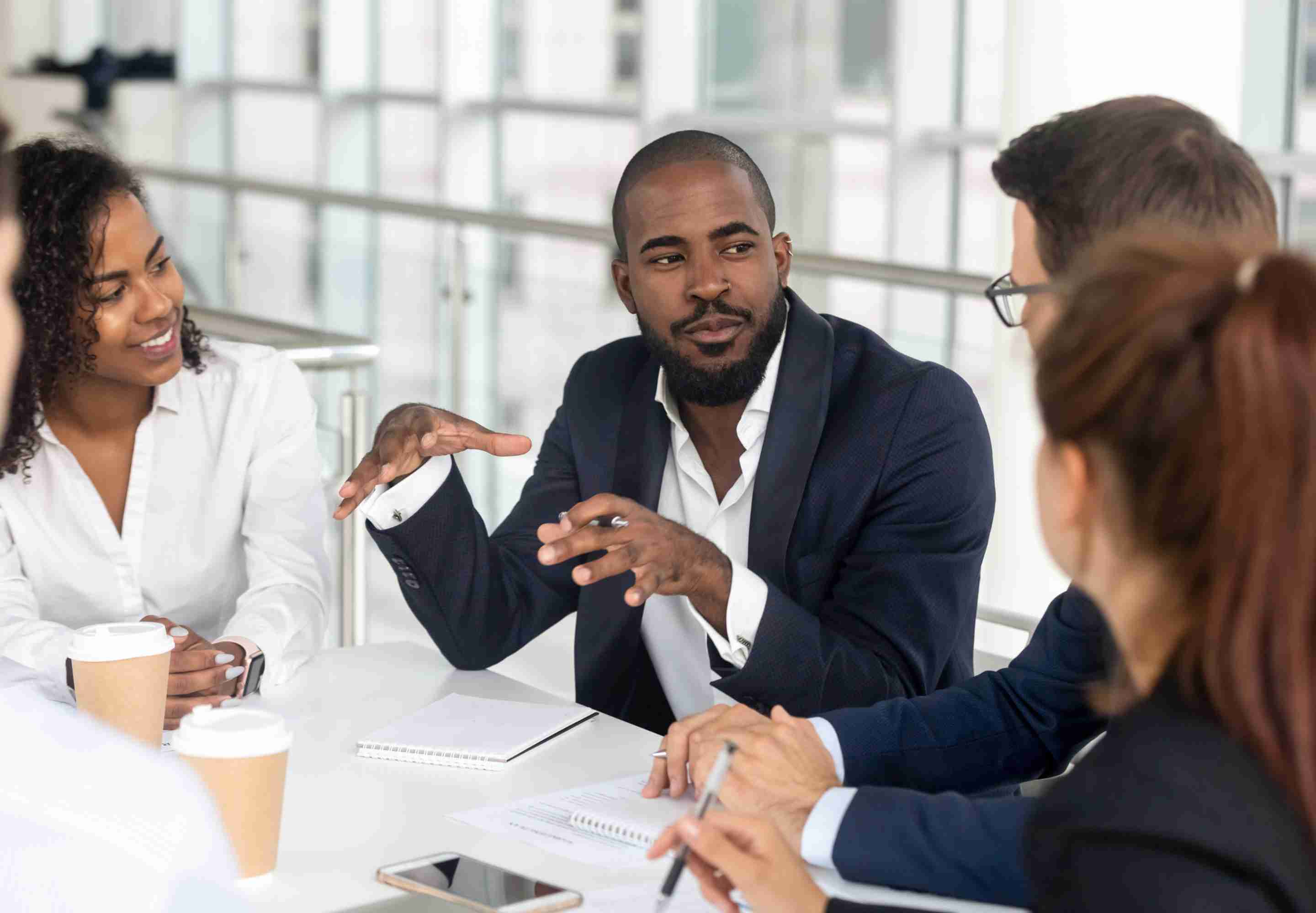 Business professionals in meeting room