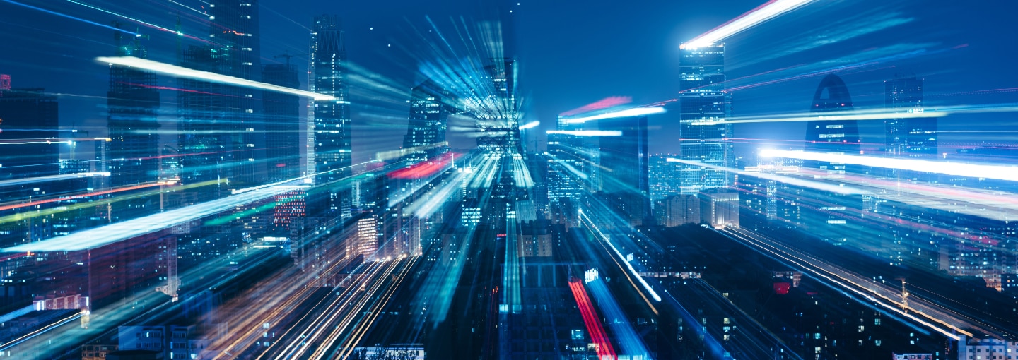 A light-blur view of a city at night