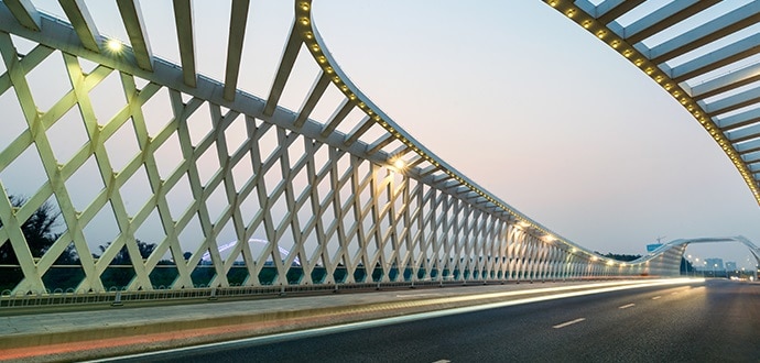 Road on bridge with ornate railings