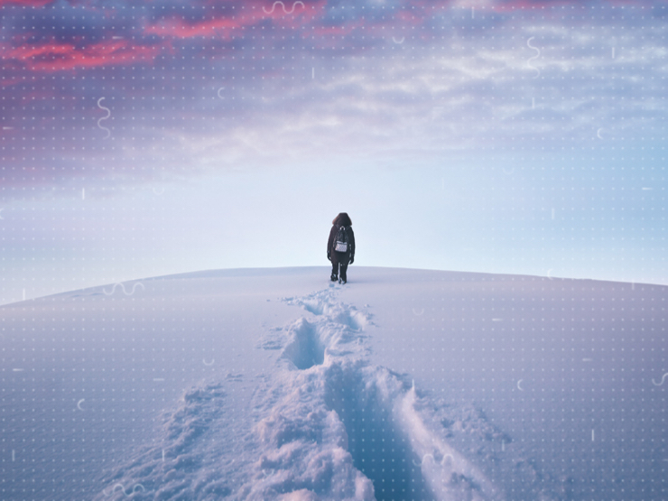 A person walking in the snow