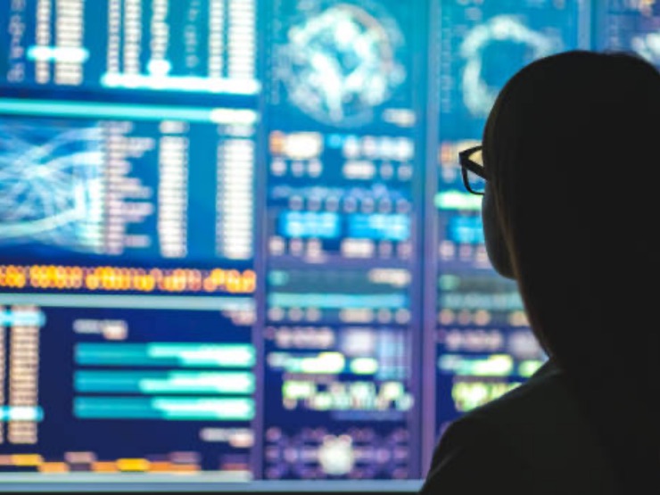 Business professional in a server room