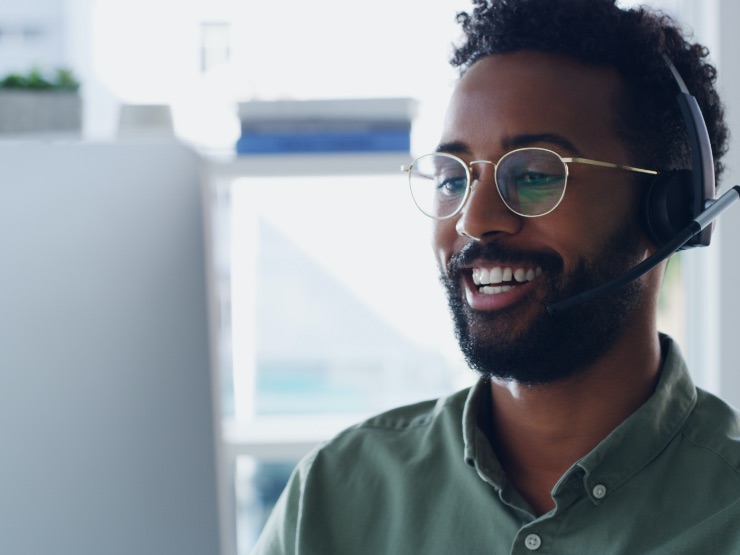 Business professional with headphones on