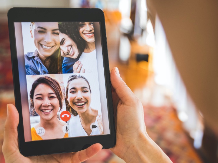 People video chatting on a device