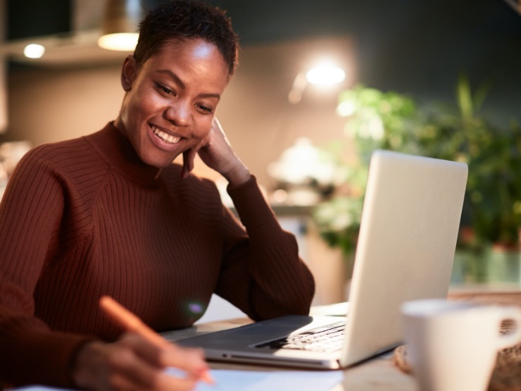 A woman working on her laptop