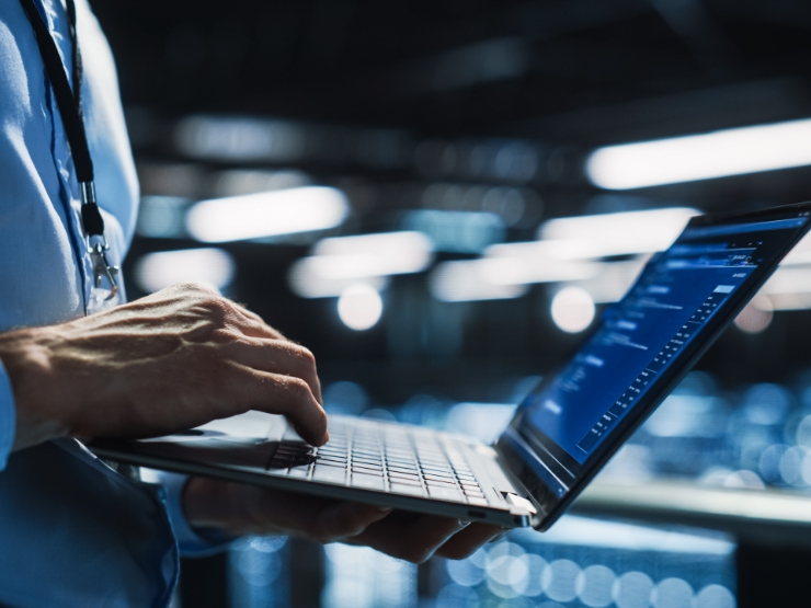 Business professional looking on the laptop