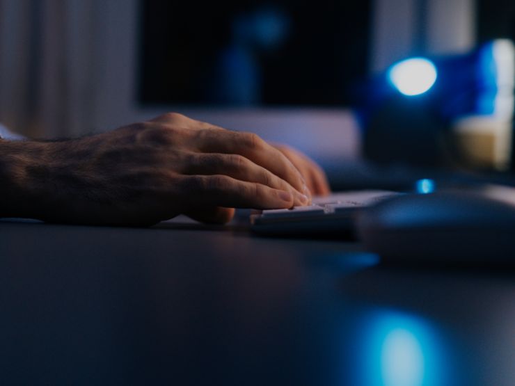 Fingers typing on a keyboard