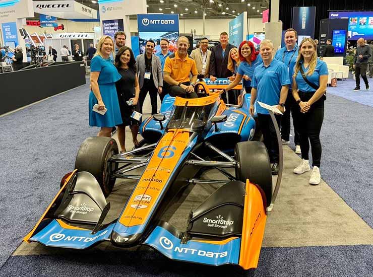 Racing fans at MWC Las Vegas had their picture taken with an INDYCAR vehicle and met racedriver Tony Kanaan to hear how NTT DATA technology had transformed INDYCAR